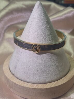 Gold-Tone Brown Patterned Bangle Bracelet with Logo Accent